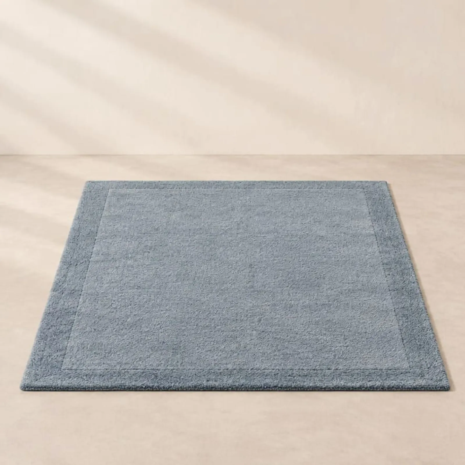 Tapis Oxel bleu océan